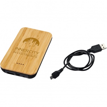 Logotrade Logogeschenke das Foto: Future 6.000 mAh kabellose Powerbank mit Ladefunktion aus Bambus/Stoff