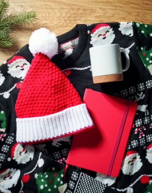 Logotrade ärikingituse foto: Jõulu sümboolikaga kootud müts